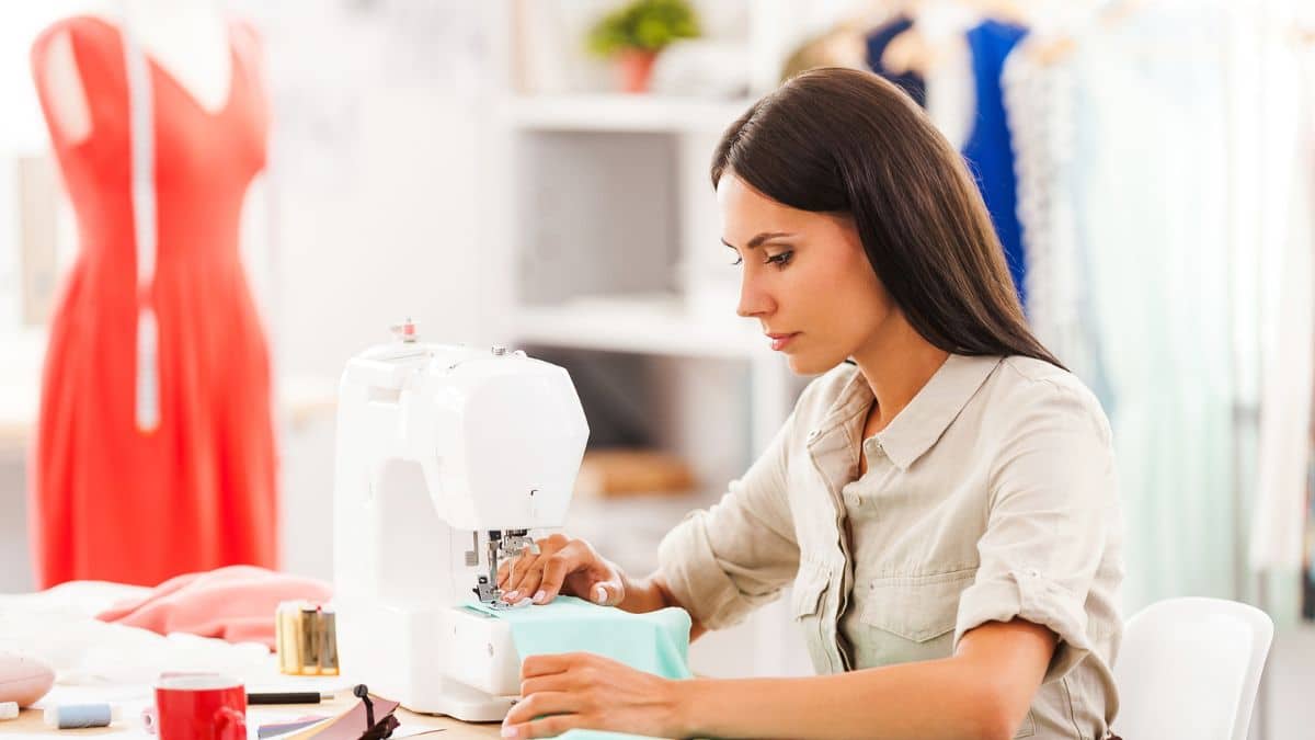 woman at a sewing machine at work