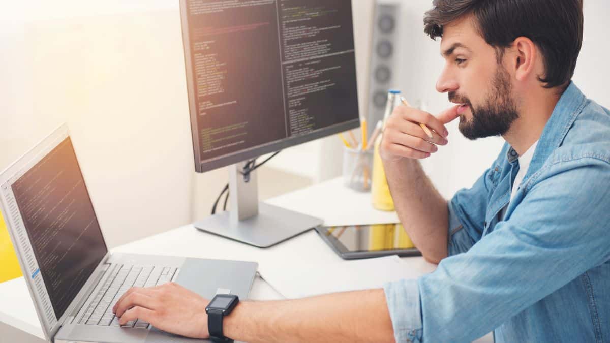 Firefox Extensions man sitting at computer